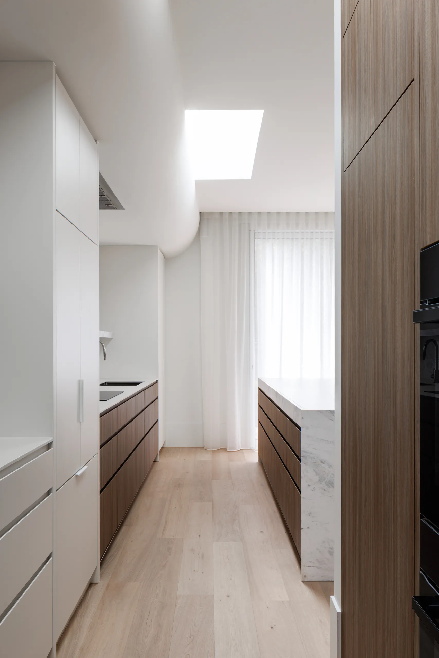 Butler's pantry with timber joinery and a skylight above